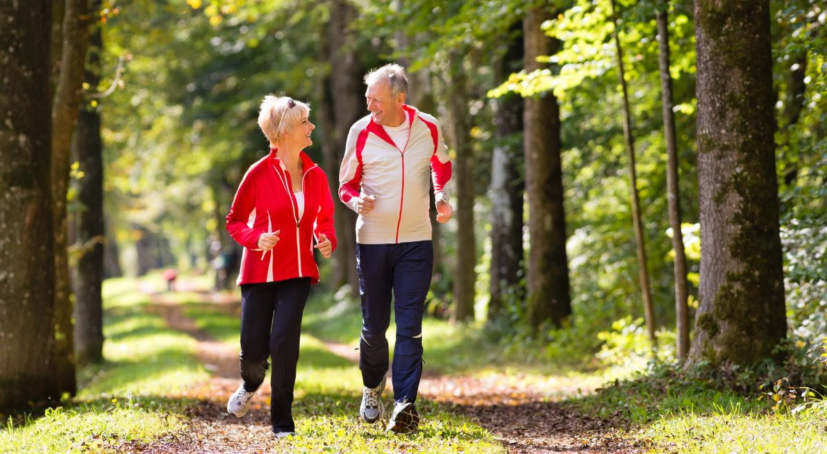 Older couple jogging