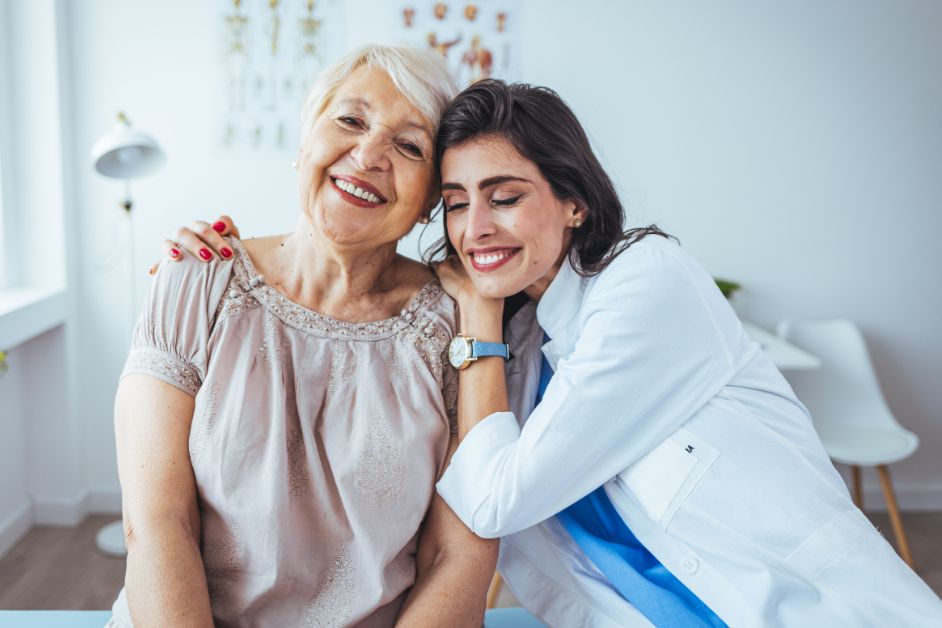 Young woman hugs older woman